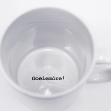 Load image into Gallery viewer, Buffelsfontein Boeretroos Coffee Mug with printed 'Goeiemöre!' text on inside of mug.