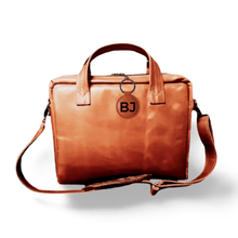 Load image into Gallery viewer, A brown leather laptop bag with two handles, a zippered closure, and a branded leather tag on the front.