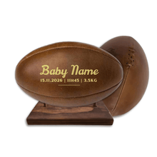 Load image into Gallery viewer, Personalised leather rugby ball with custom branding South Africa handcrafted gift on wooden ball stand.
